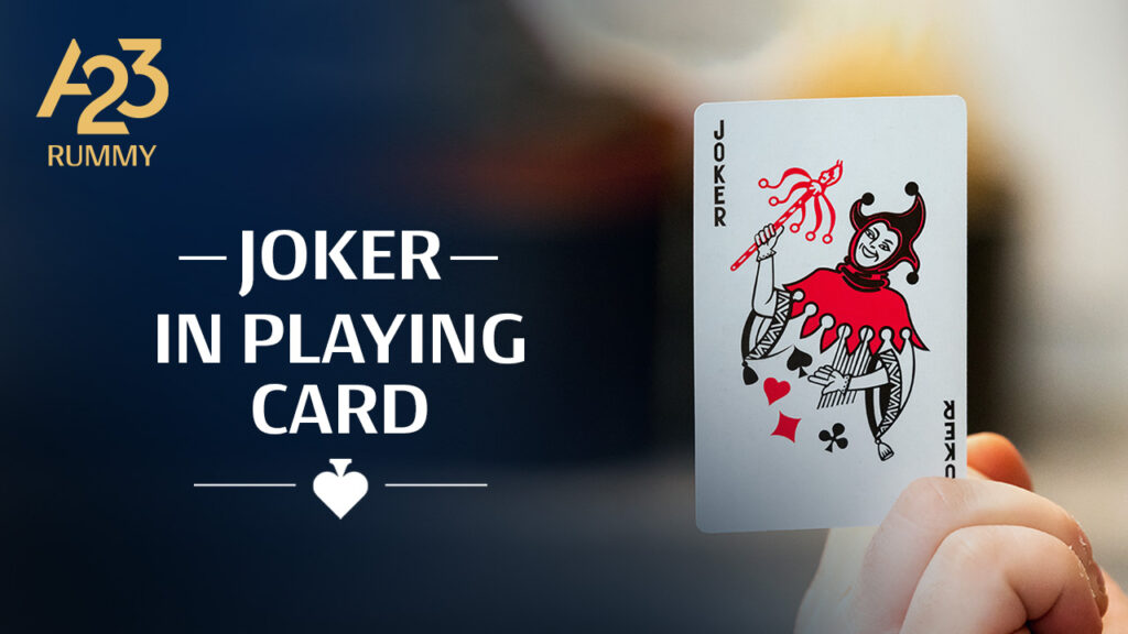 A23 Rummy banner image where a hand showing paper joker in the background with "Joker in playing card" as a text on the banner image.